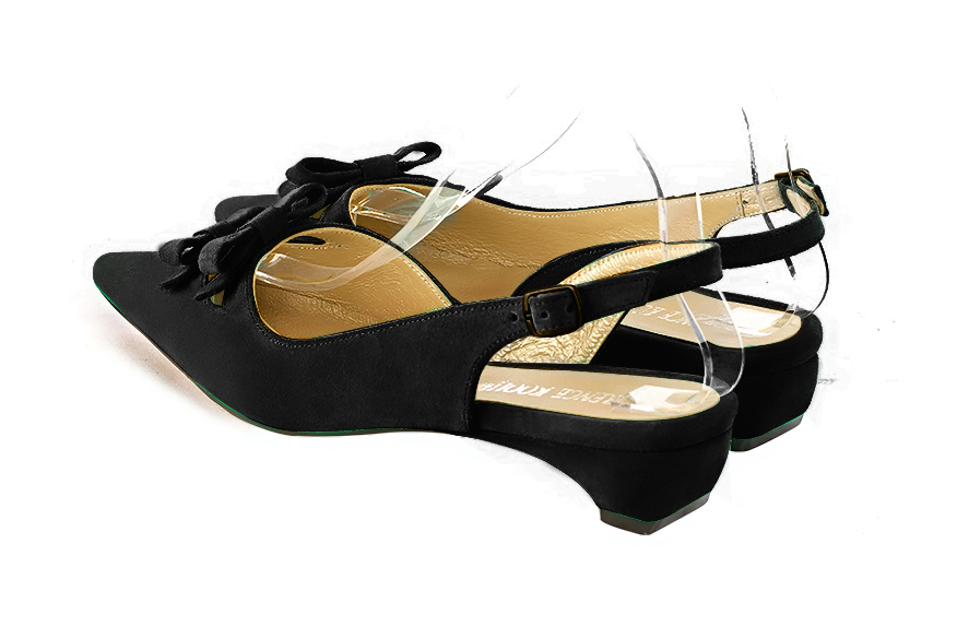 Women's matt black elegant slingback heels, with a bow on the front. Pointed toe. Low kitten heels - Rear view